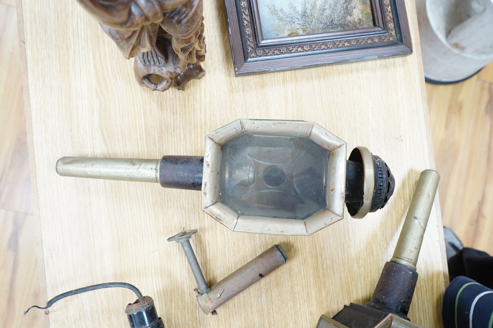 A pair of late 19th century carriage lamps and another